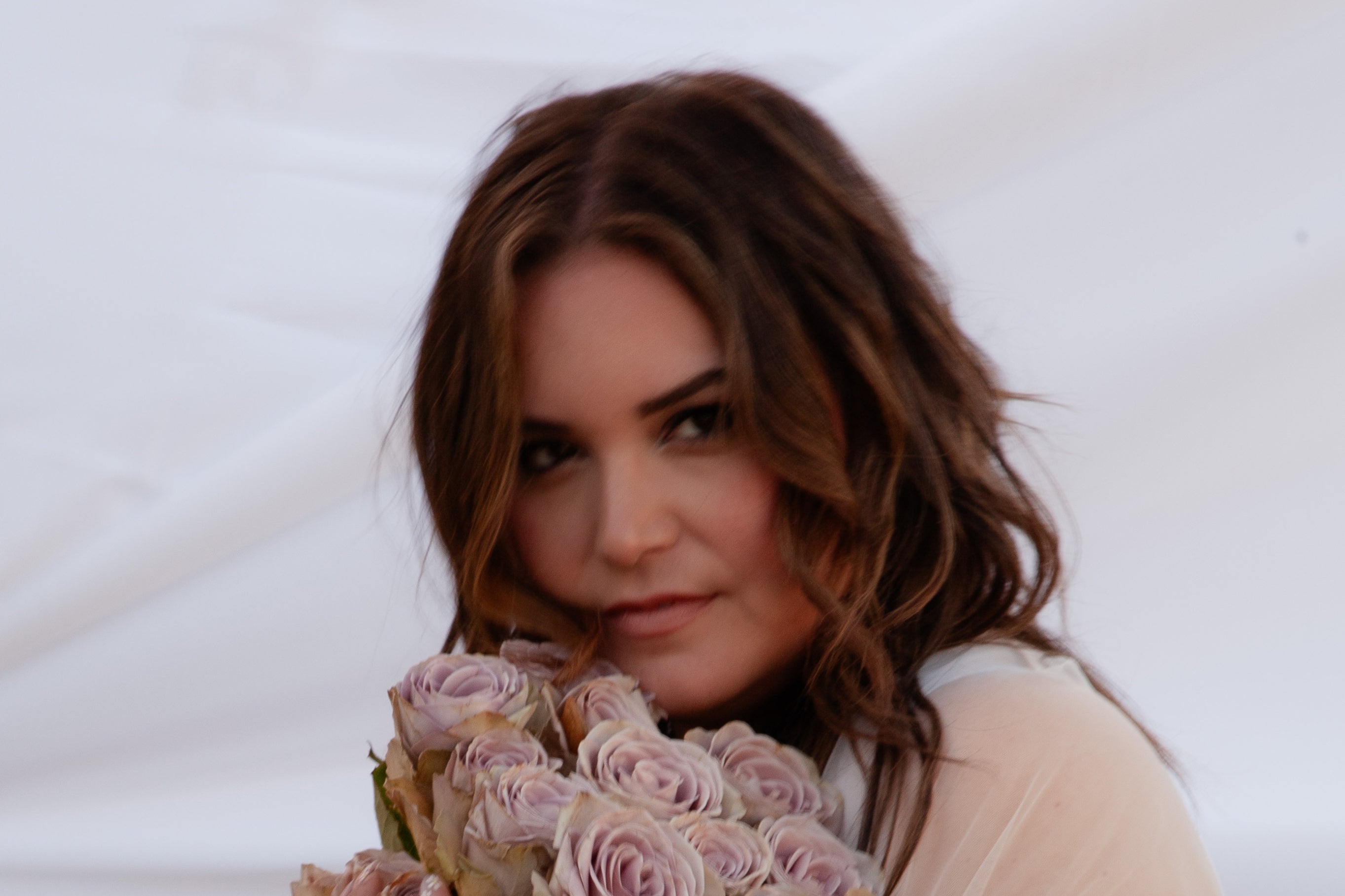 Reina Mora's 'Weeds' Blossoms from Heartache into Anthem of Resilience