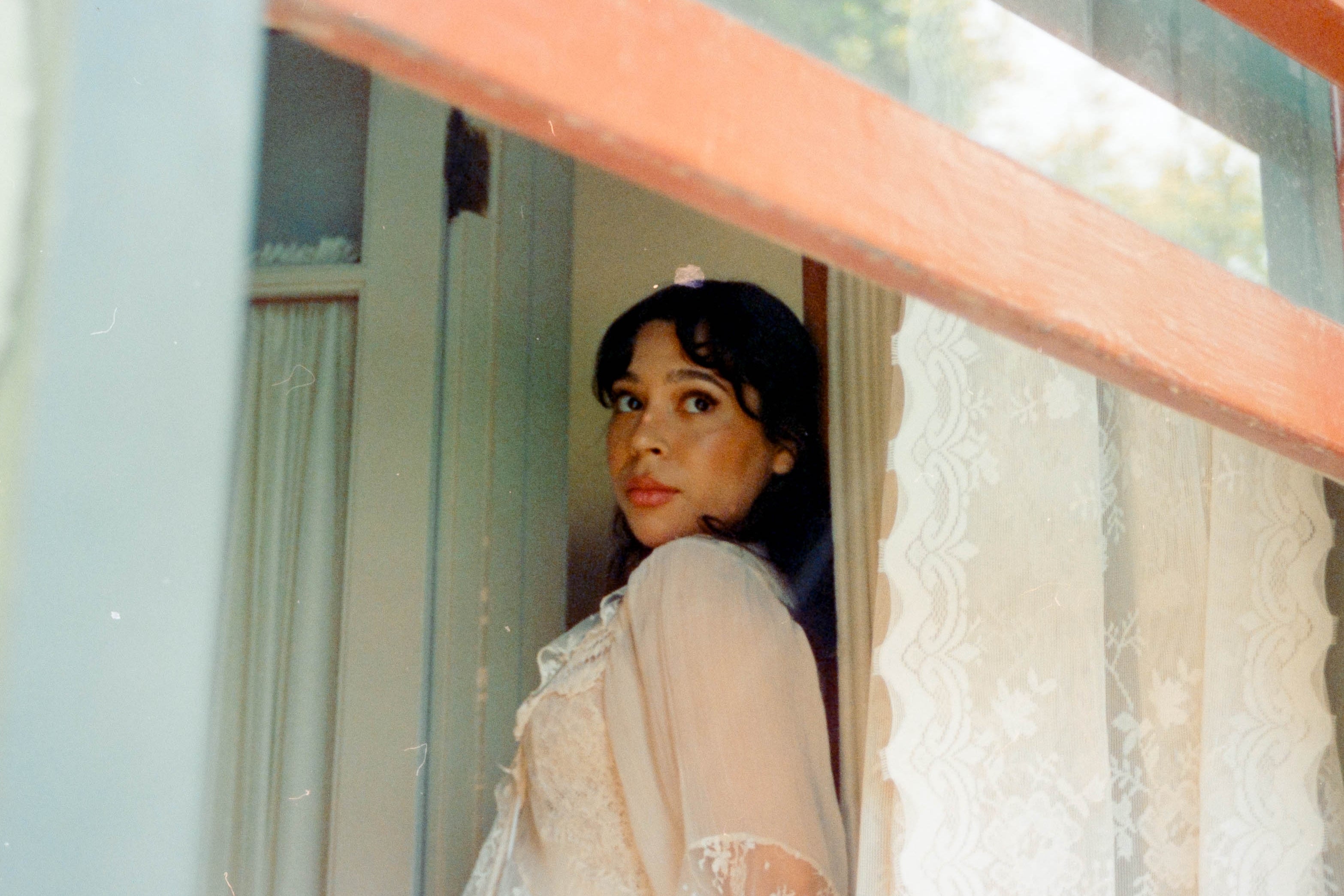 Emelia Confronts Loss with Tender Grace on 'Ghost In The House'